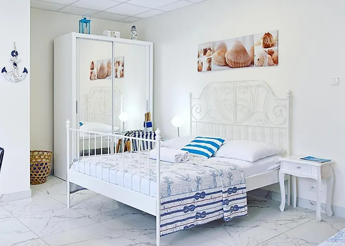 Muszelka Pokoje I Apartamenty